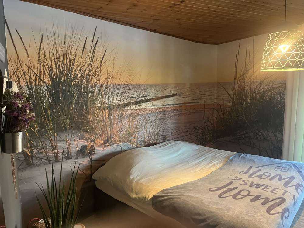 Plage de dunes avec coucher de soleil