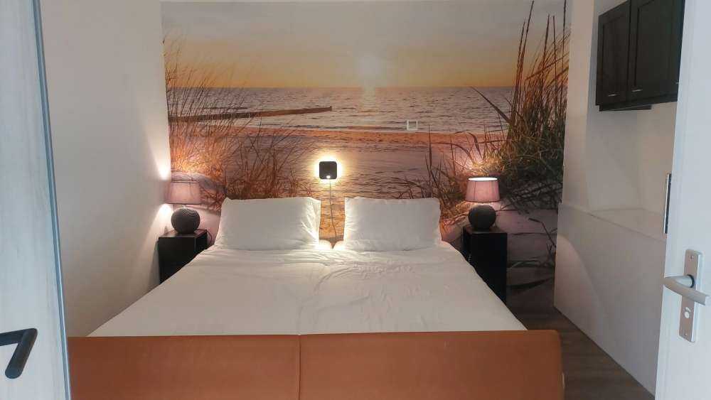 Plage de dunes avec coucher de soleil
