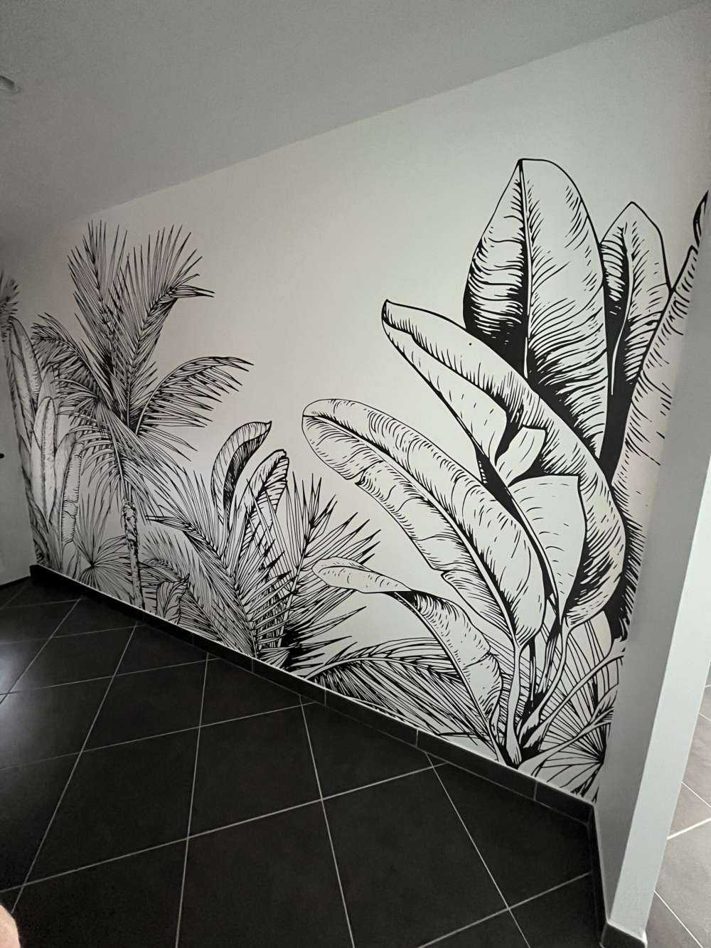 Palmiers et feuilles de bananier