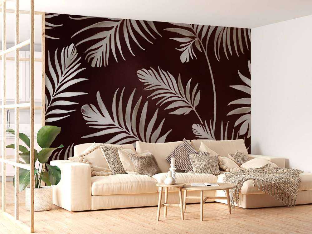 Feuilles dorées sur un bleu profond et sombre