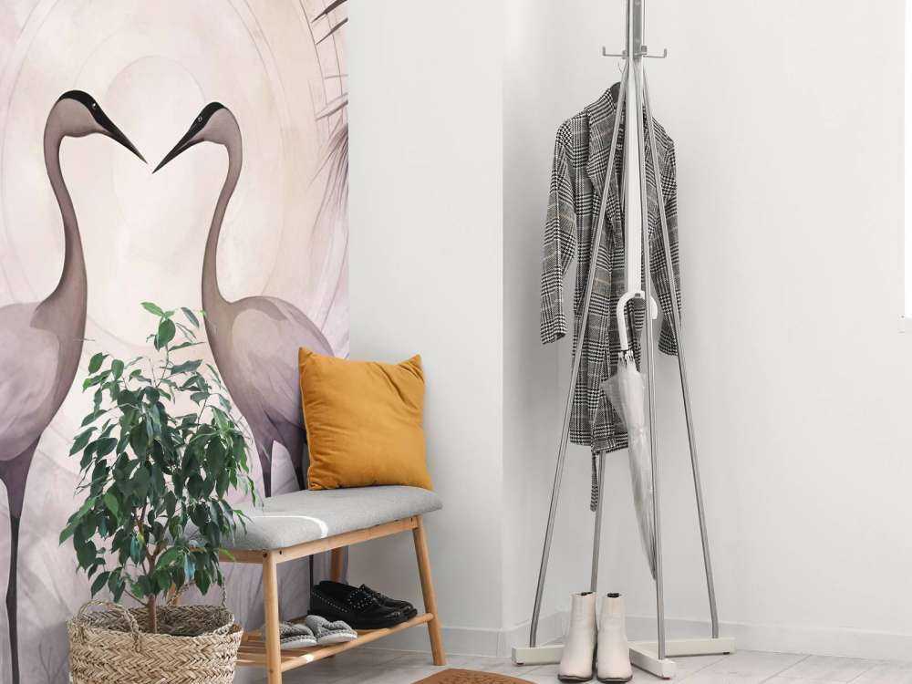 Grues au crépuscule gris