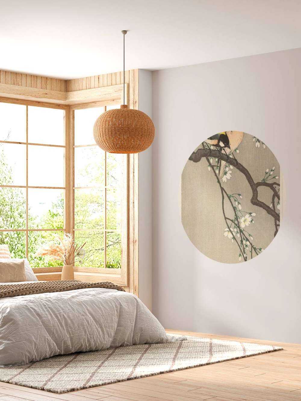 Nénés sur une branche fleurie