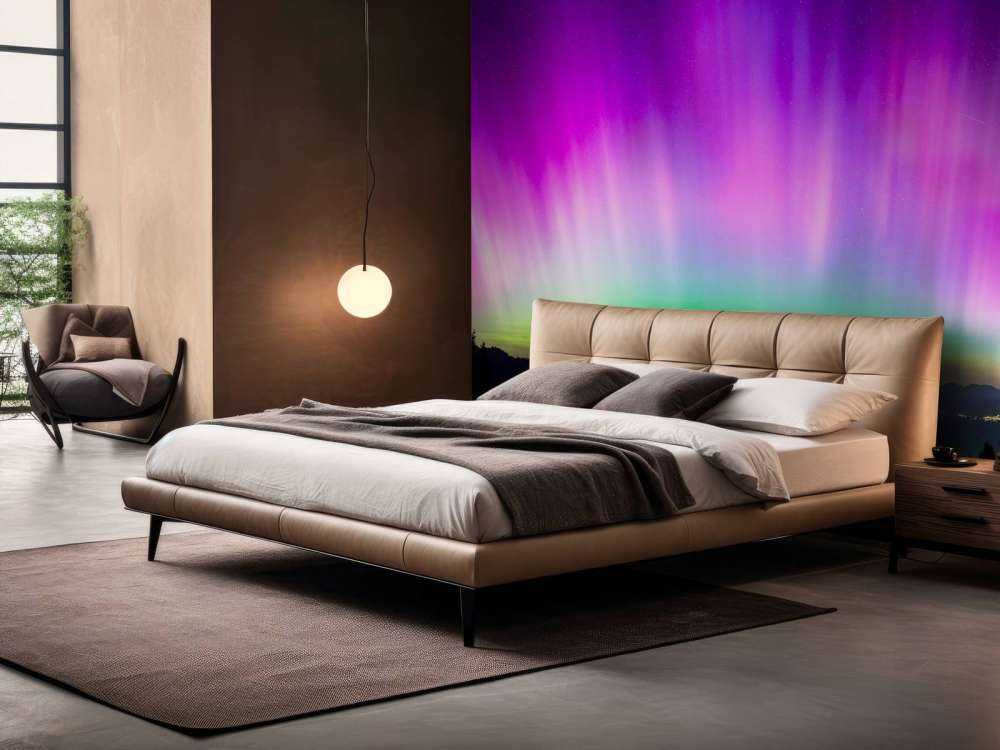 Aurore boréale au-dessus de la ville de montagne illuminée