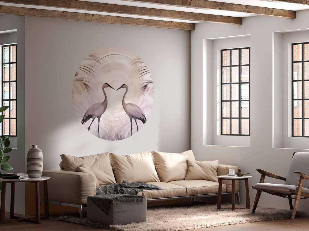 Grues au crépuscule gris