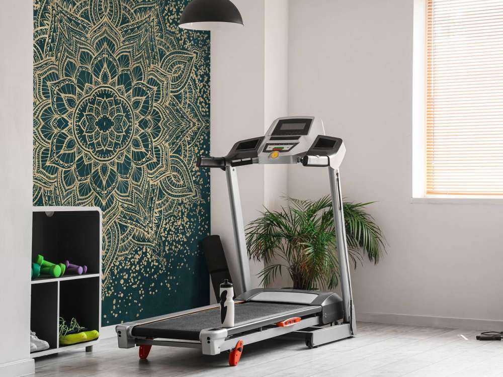 Mandala doré sur vert émeraude.