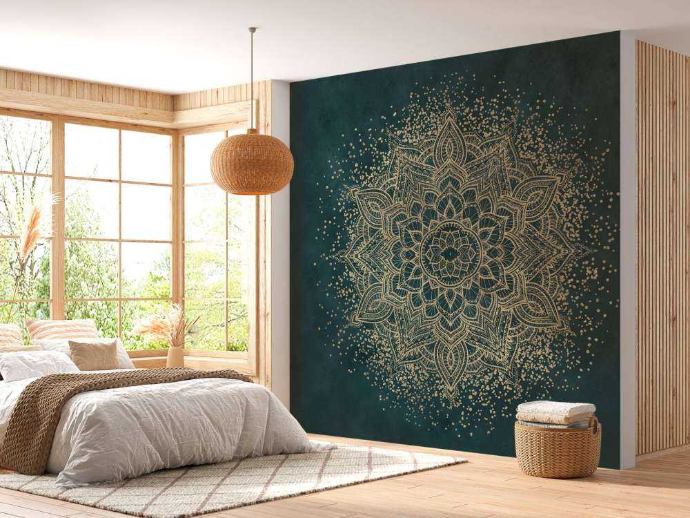 Mandala doré sur vert émeraude.