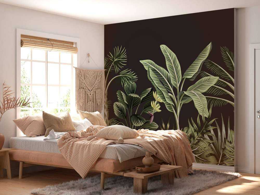 Palmier tropical sur fond sombre