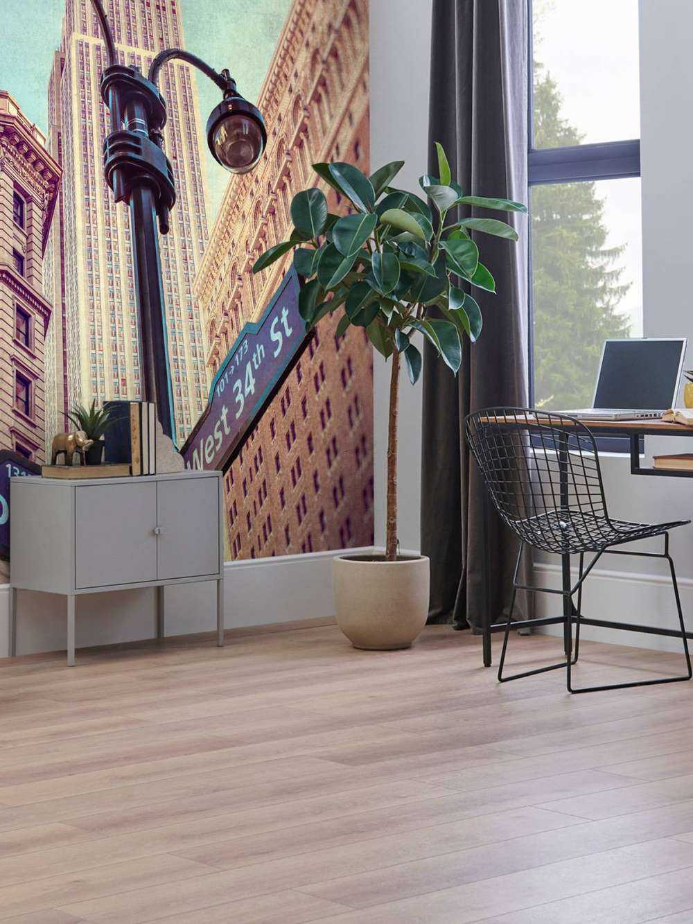 Street lamp and street signs with Empire State building in background - New York