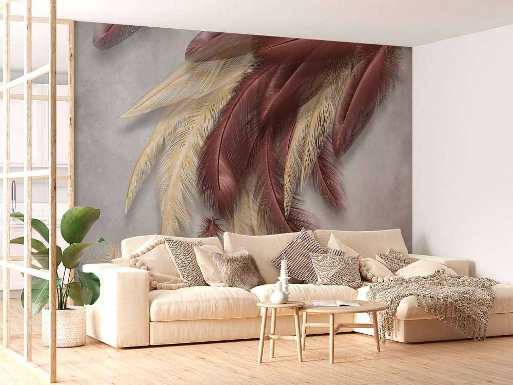 Plumes sur du béton