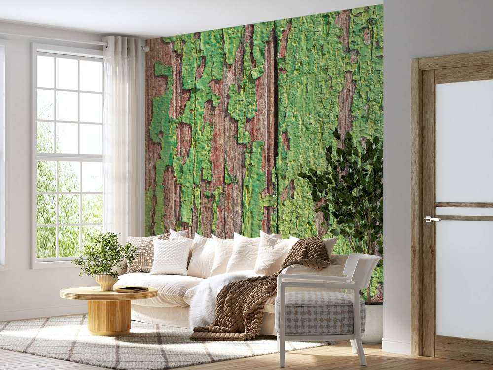 Bois vieilli avec une couche de peinture verte