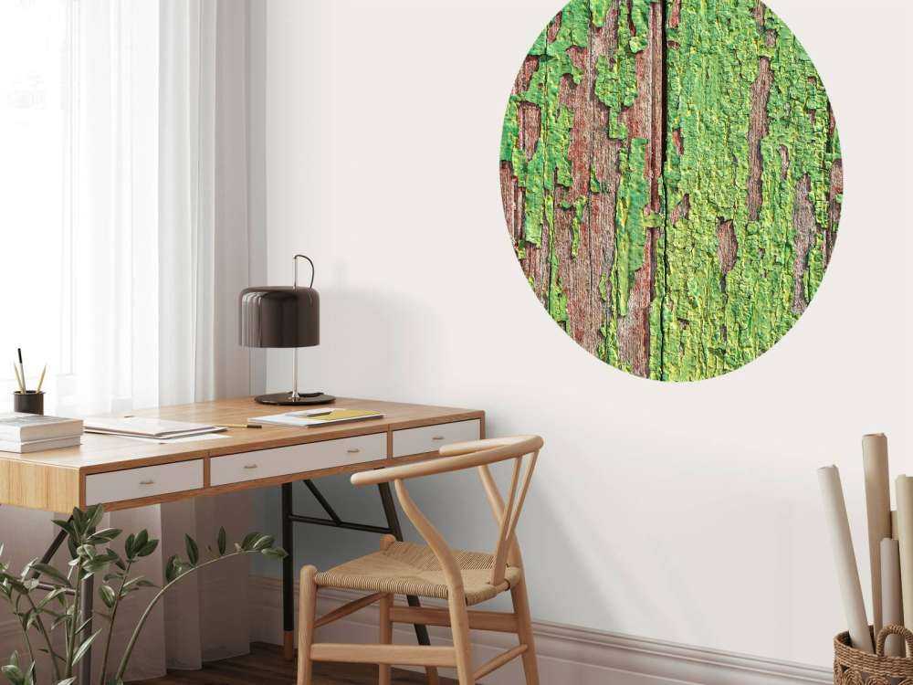 Bois vieilli avec une couche de peinture verte