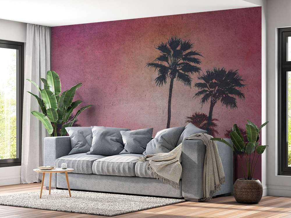 Palmiers dans la lueur rose du soir