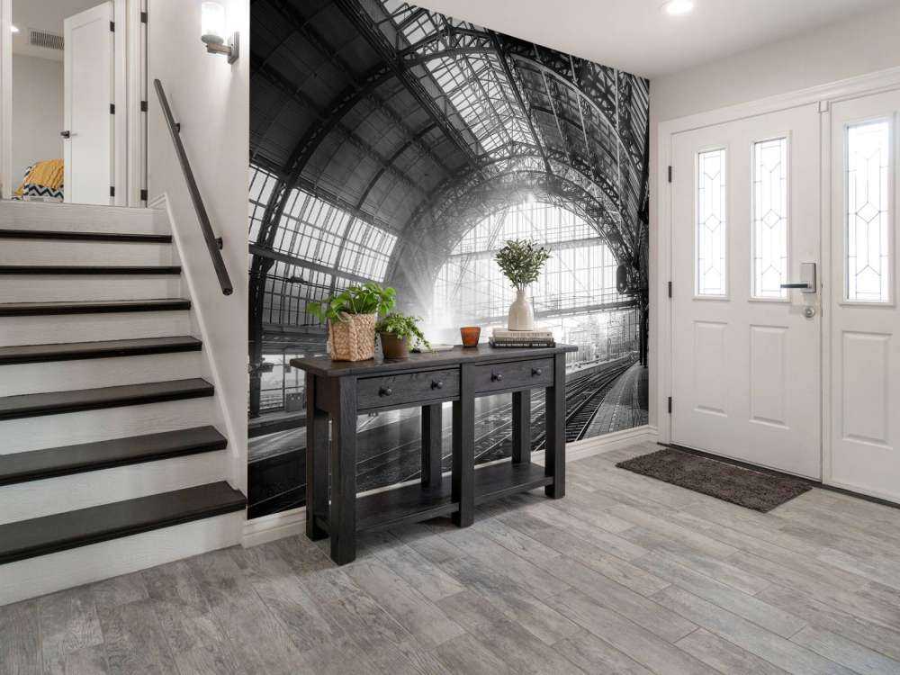 Lever de soleil sur une station en noir et blanc