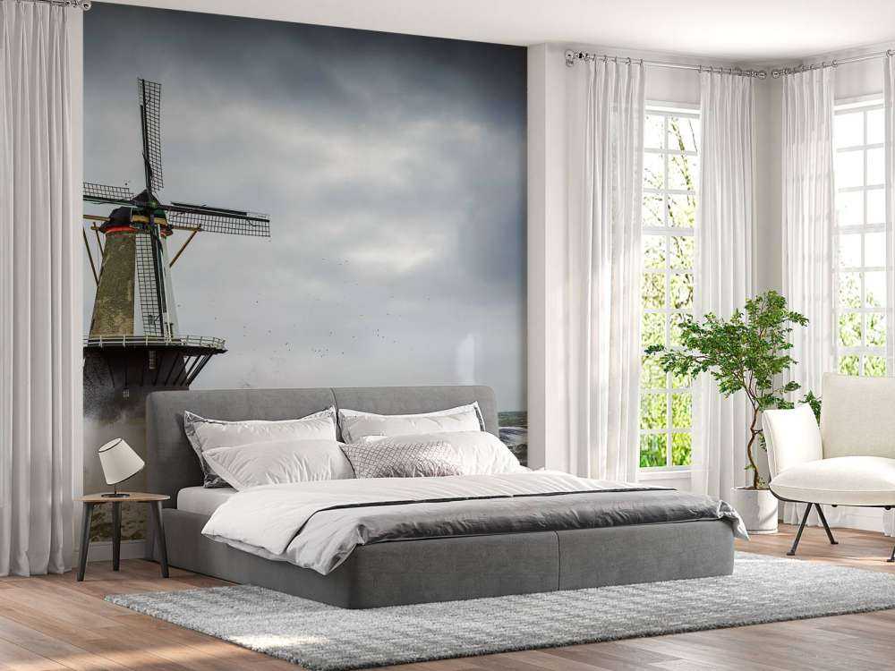 Moulin avec des vagues de tempête