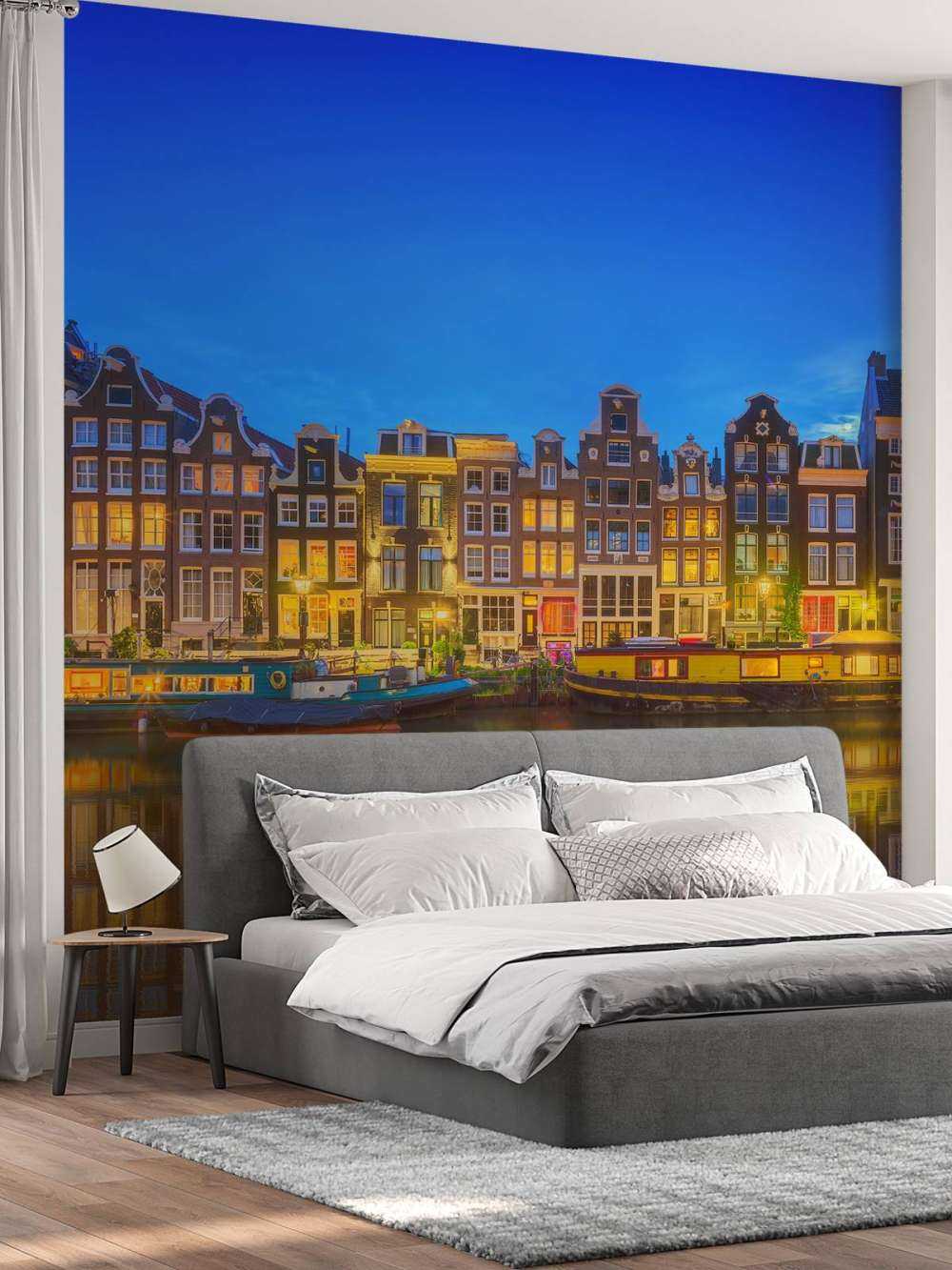 Le canal d'Amsterdam la nuit