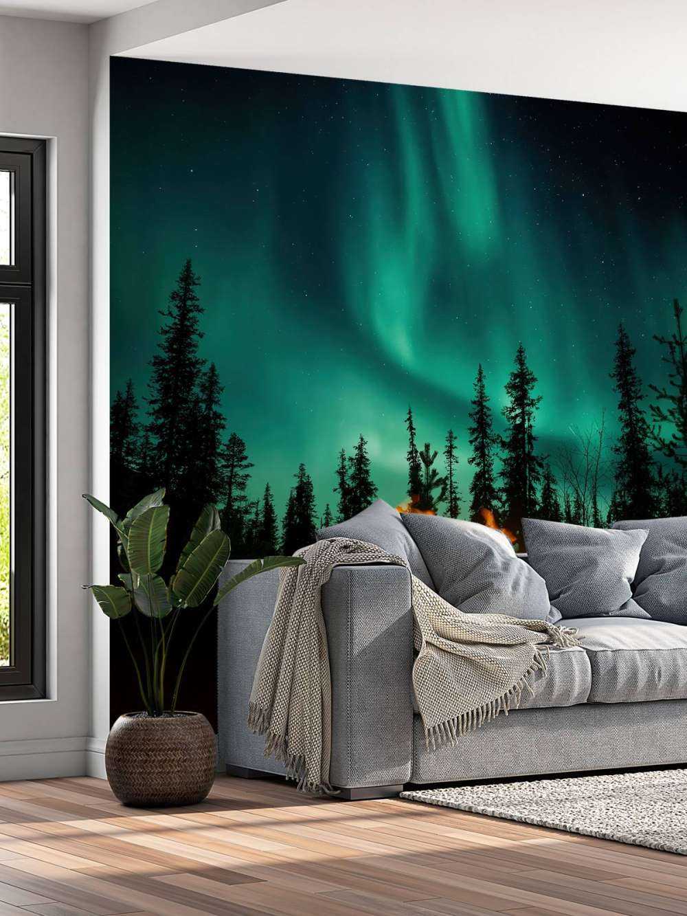 Feu de camp sous les aurores boréales