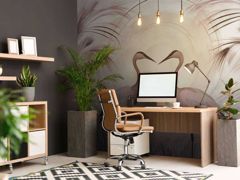 Grues au coucher du soleil rose