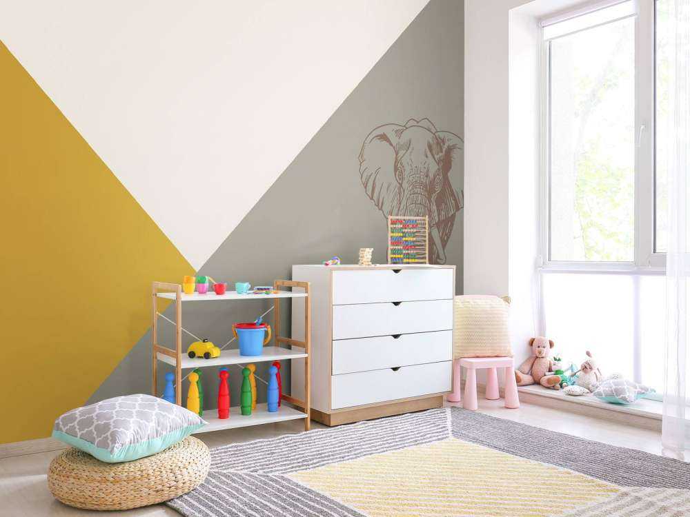 Triangles en jaune ocre et vert avec éléphant