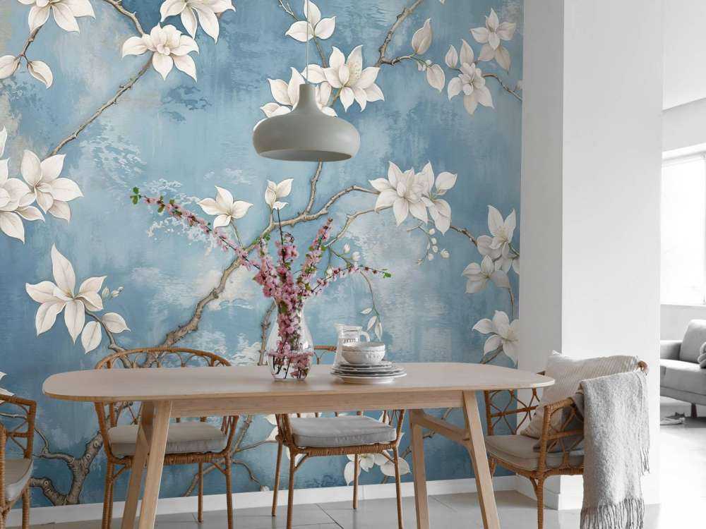 Fleur de magnolia blanche sur fond bleu