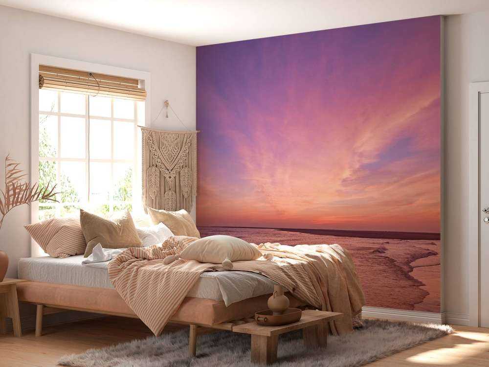 Plage avec coucher de soleil rose