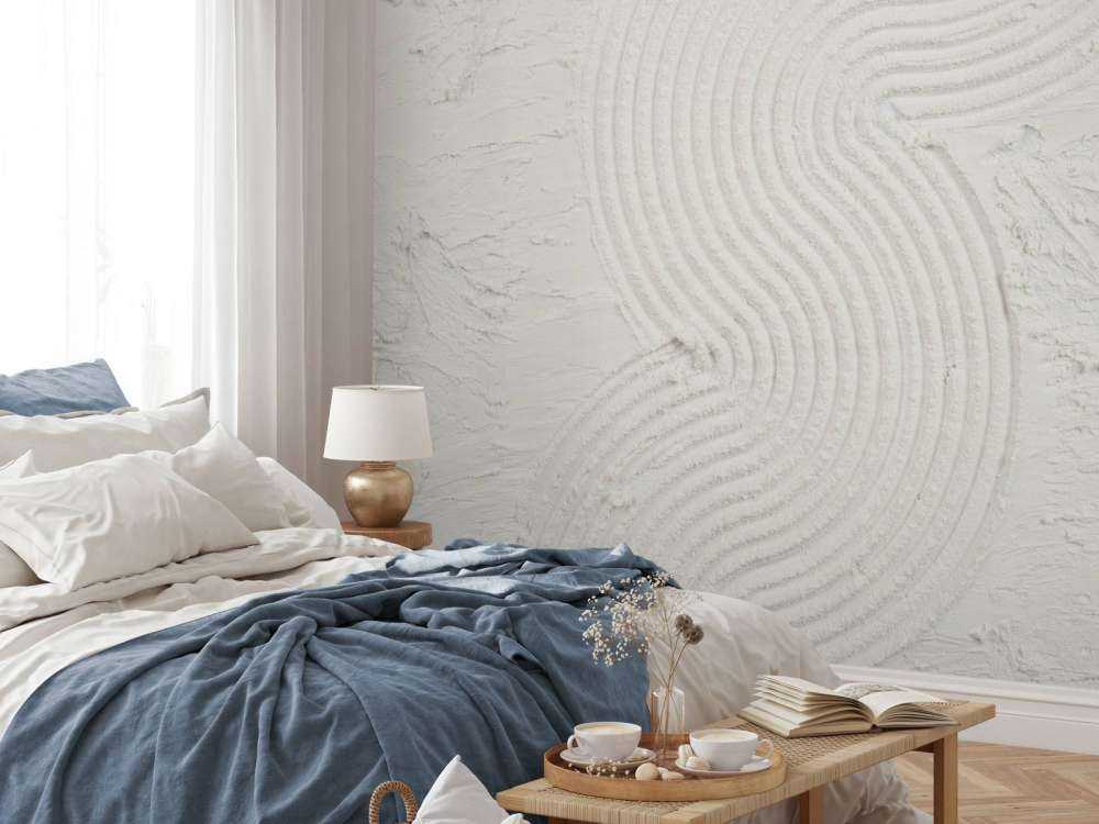 Zoom sur courbes et structures organiques en blanc cassé