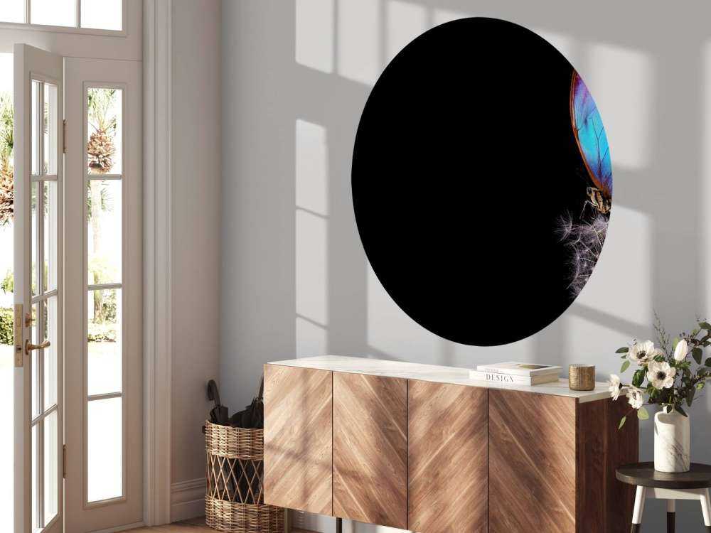 Papillon bleu sur un pissenlit