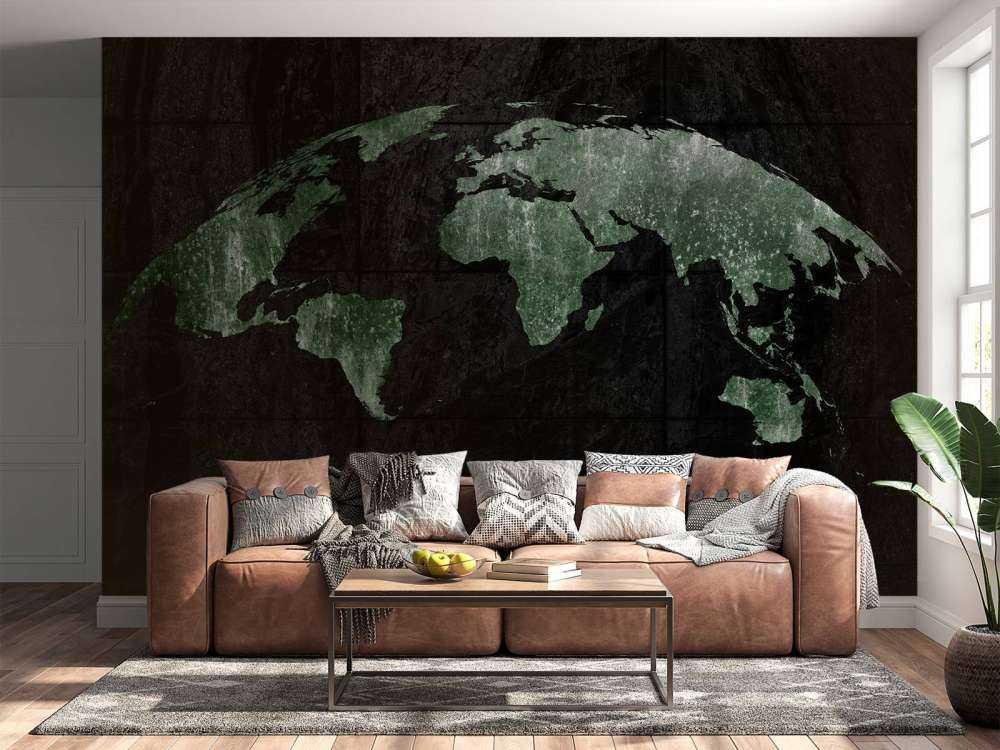 Carte du monde verte sur du béton