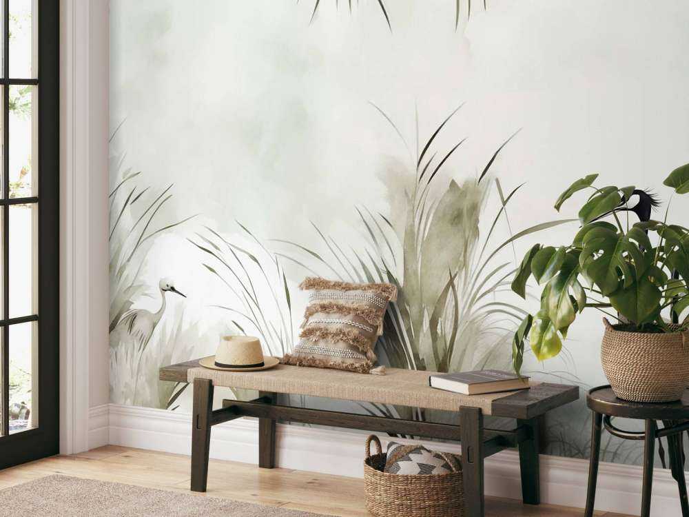 Grues dans le champ vert