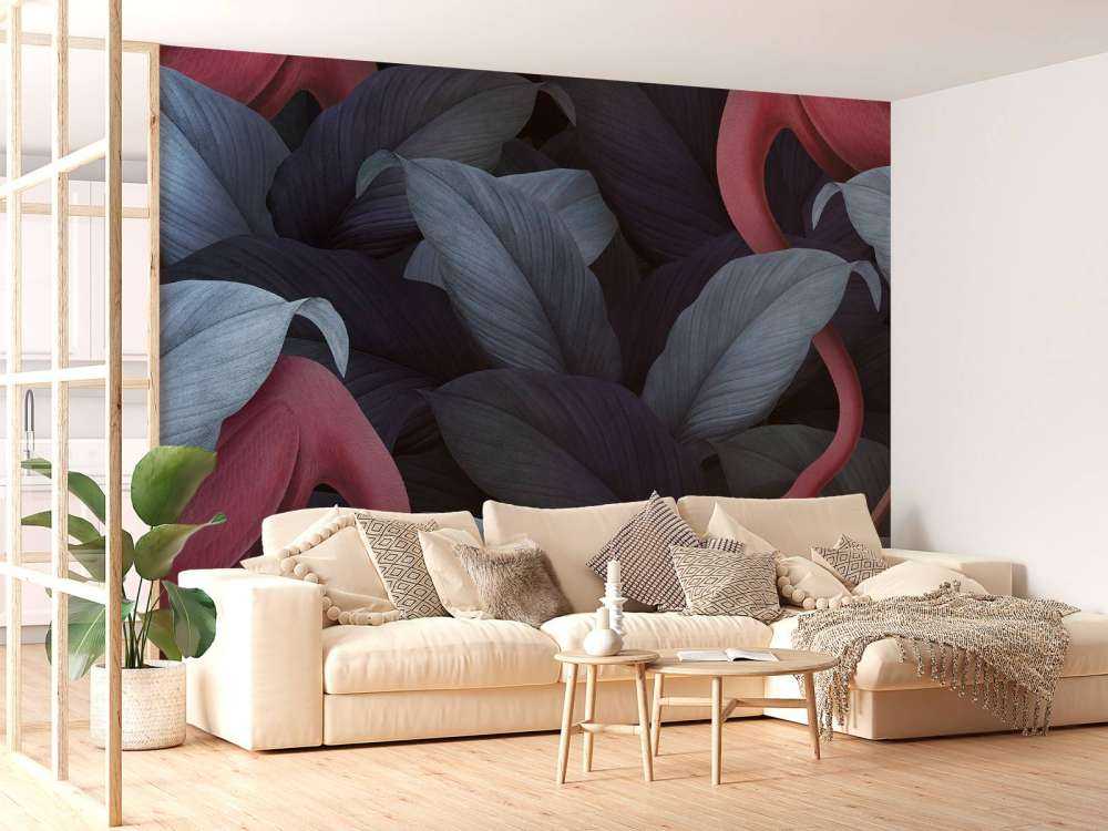 Flamants roses avec des feuilles bleues