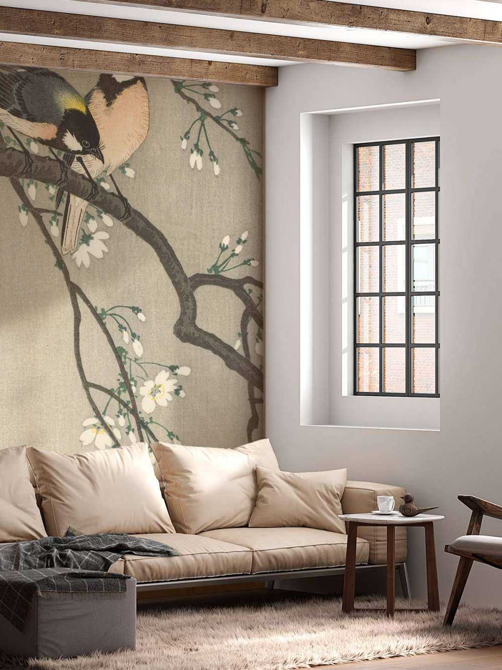 Nénés sur une branche fleurie