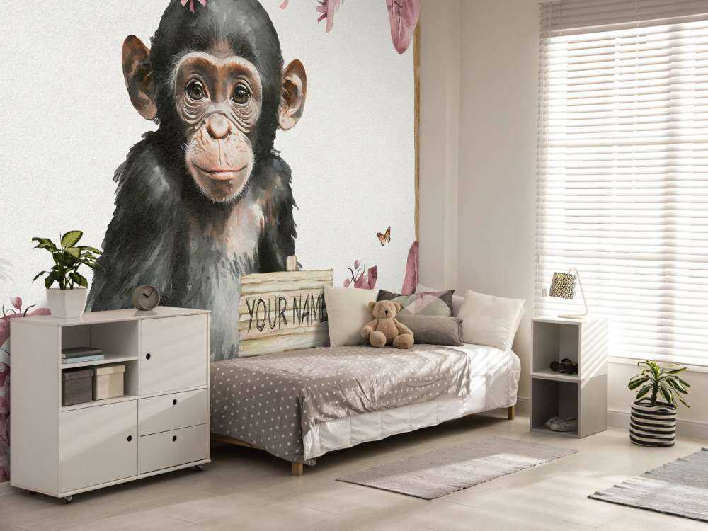 Bébé chimpanzé dans la jungle rose