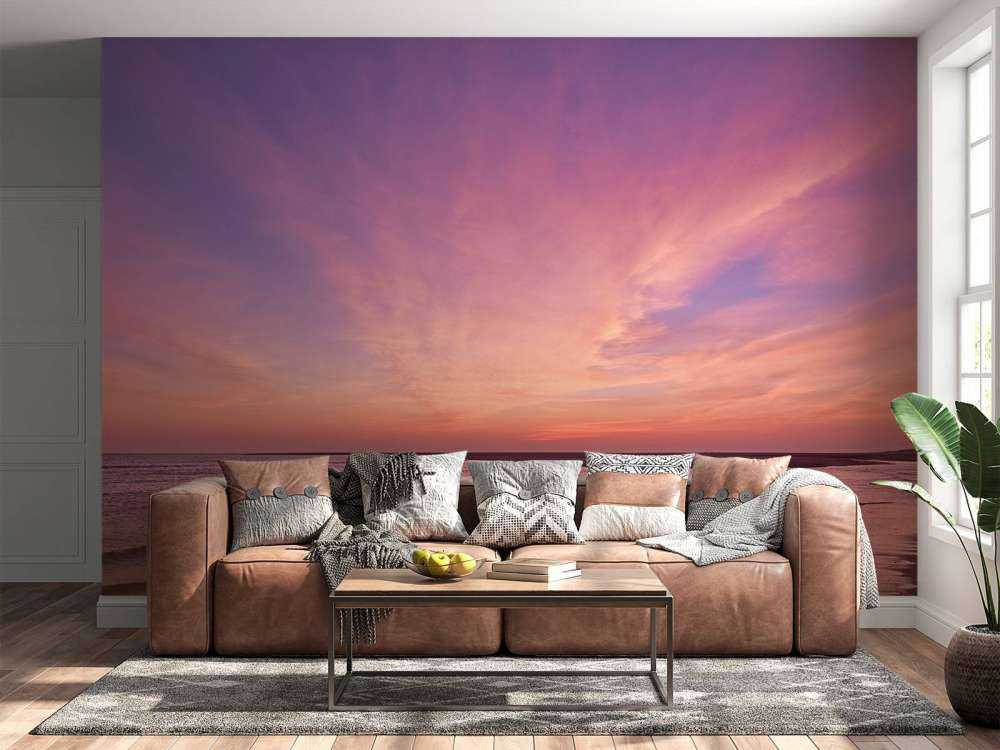 Plage avec coucher de soleil rose