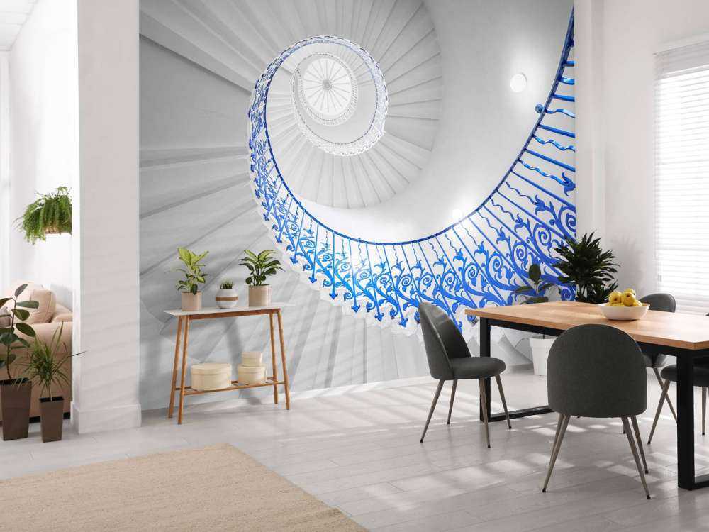 Escalier en colimaçon blanc avec rampe bleue