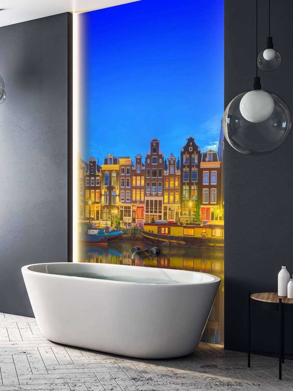 Le canal d'Amsterdam la nuit