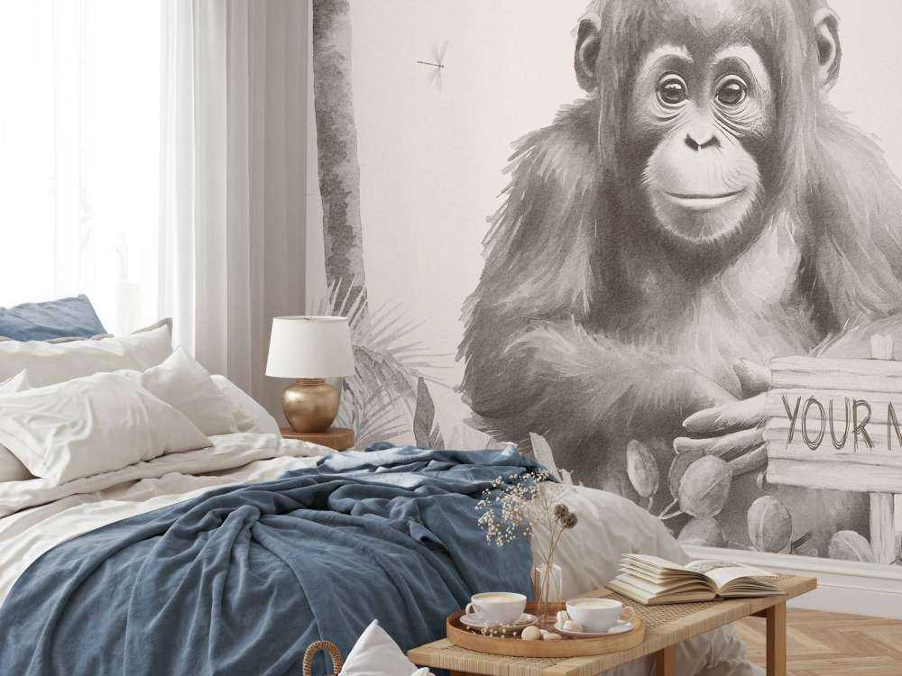 Bébé orang-outan dans la jungle beige