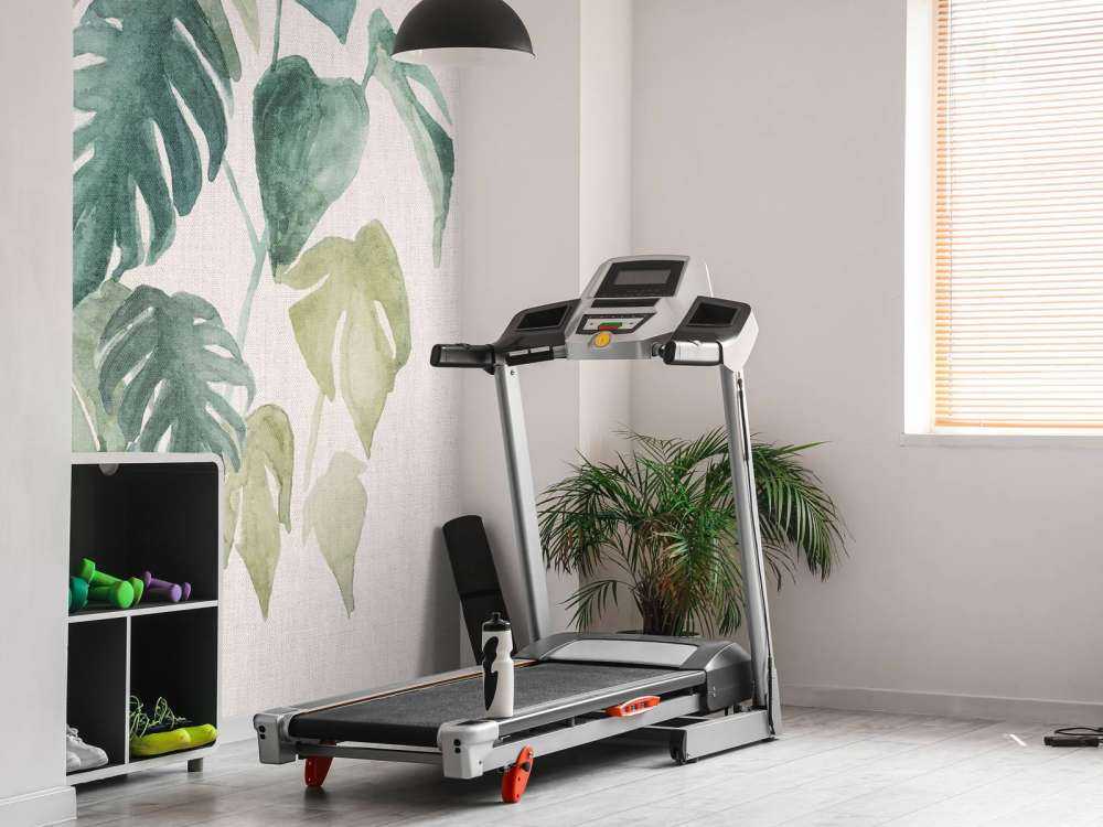 Feuilles d'aquarelle dans des tons tropicaux