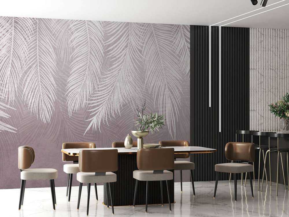 Feuilles de palmier sur un mur en béton