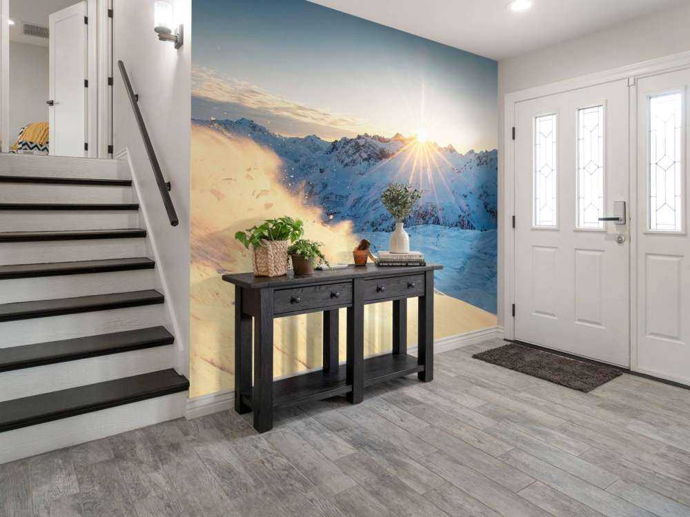 Skier dans un panorama alpin ensoleillé.