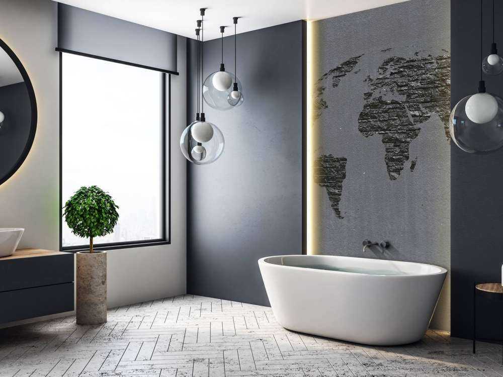 Pierres de la carte du monde sur du béton gris