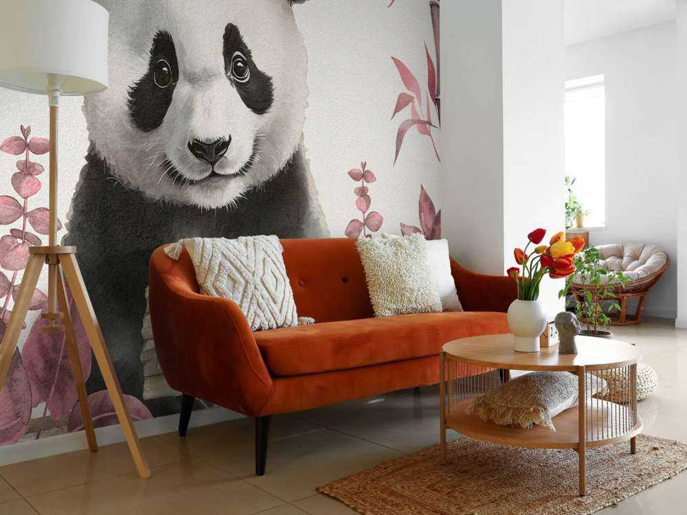 Bébé panda dans la jungle rose