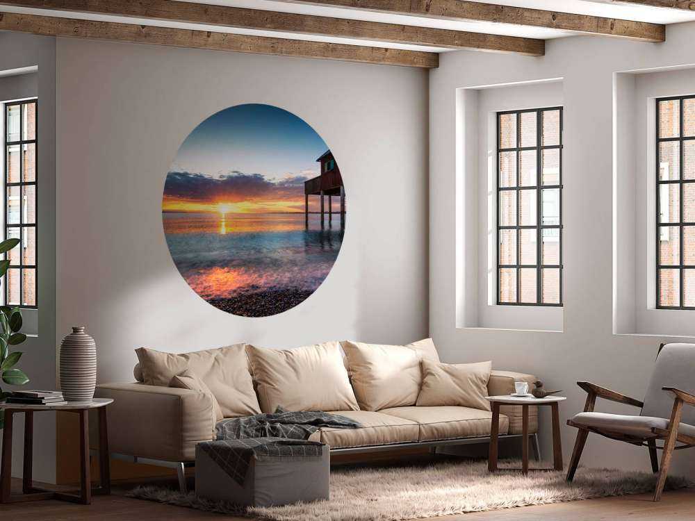 Coucher de soleil au calme maison de quai