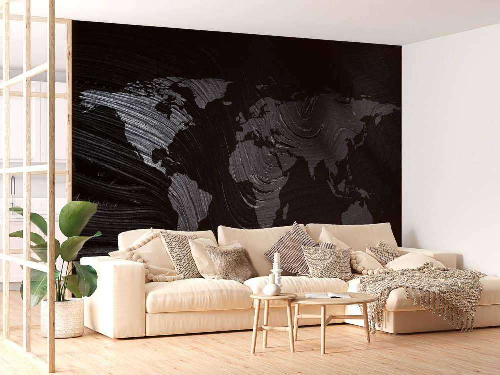 Carte du monde sur une feuille de palmier