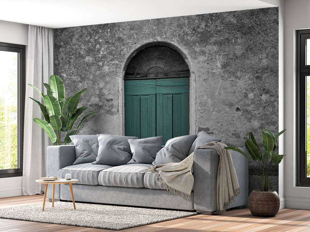 Porte verte dans un vieux mur