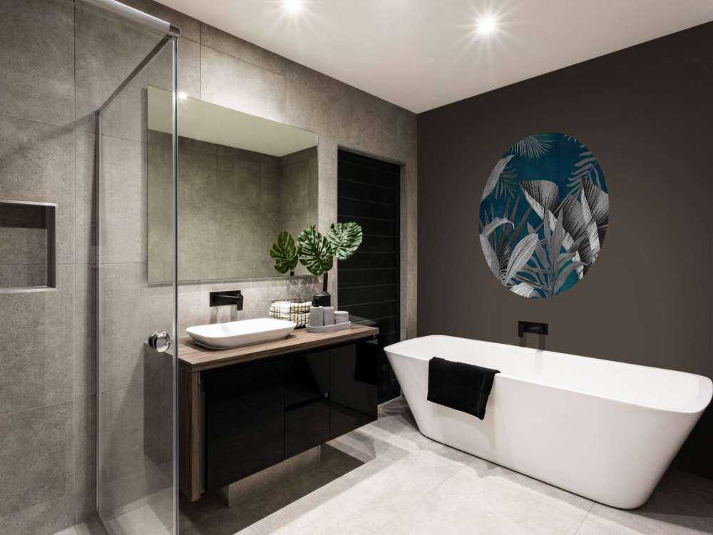 Feuilles tropicales sur fond bleu canard