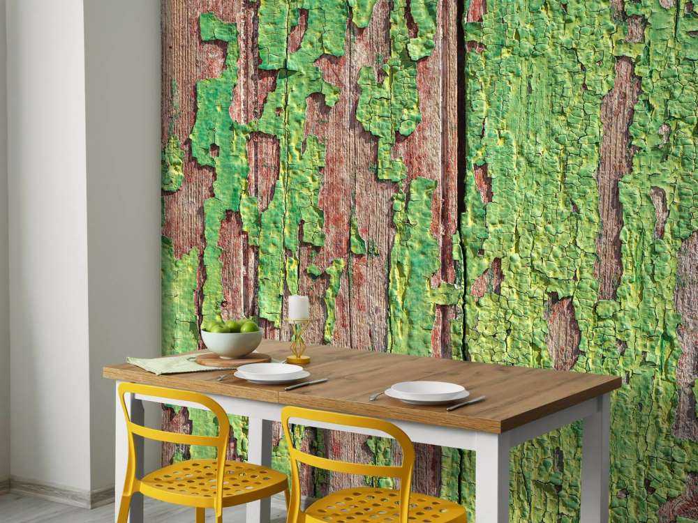 Bois vieilli avec une couche de peinture verte