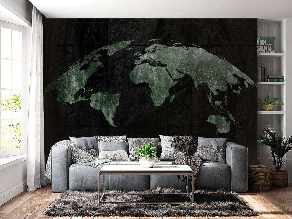 Carte du monde verte sur du béton