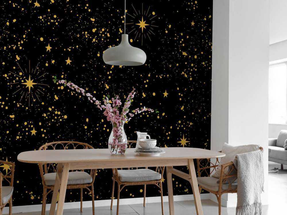 Pluie d'étoiles dorées sur fond noir
