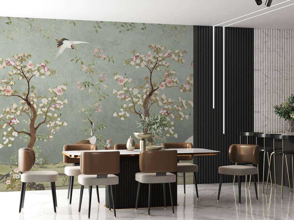 Arbres en fleurs avec des grues sur fond vert jade