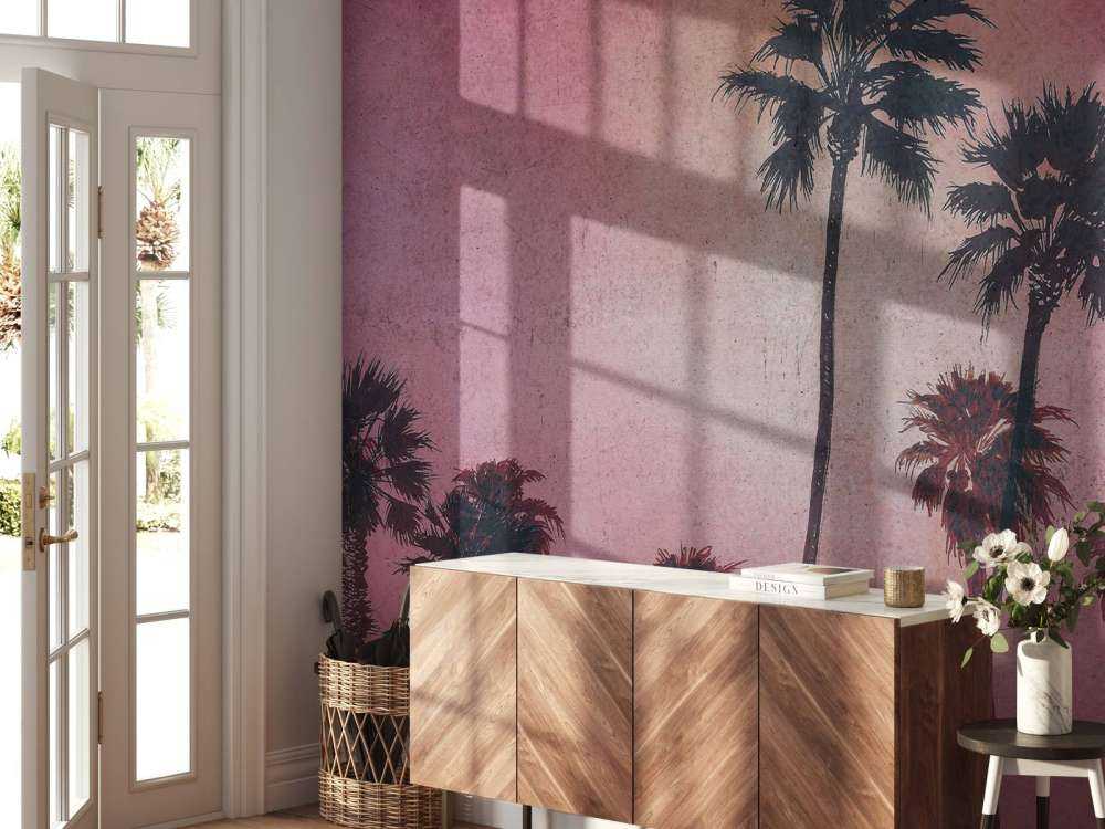 Palmiers dans la lueur rose du soir