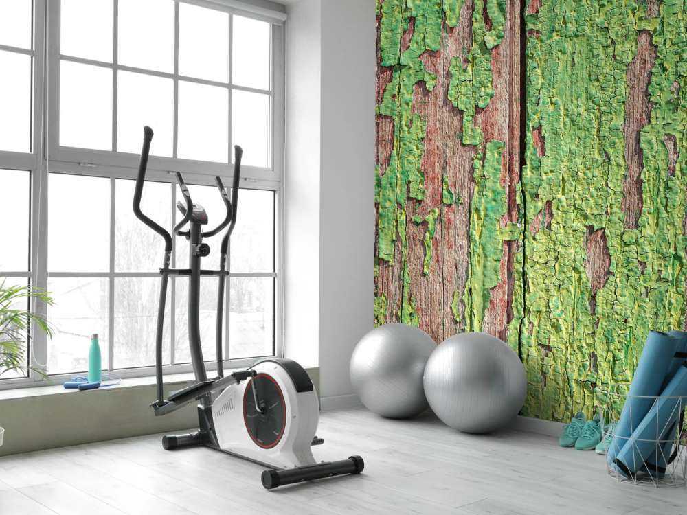 Bois vieilli avec une couche de peinture verte
